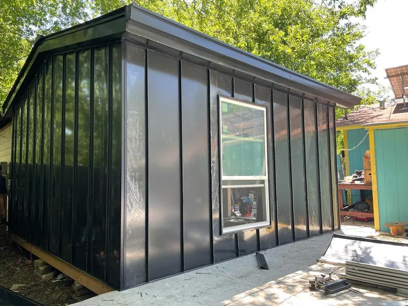 Black standing seam metal wall panels for Metal Roof Installation in Wrentham