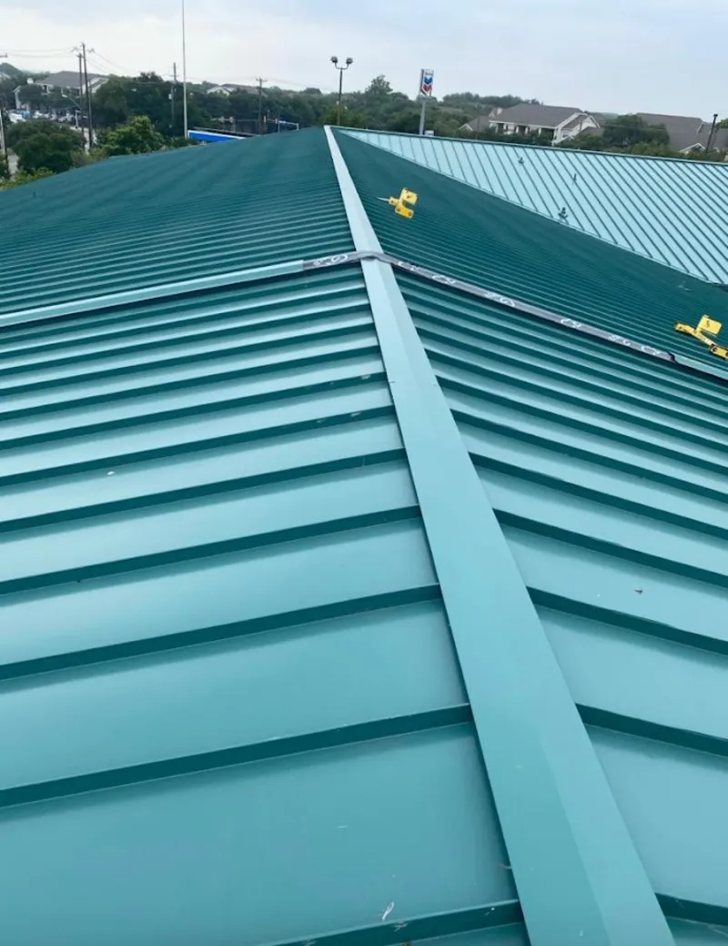 Green commercial metal roof ridge and valley for Metal Roof Repair in Wrentham