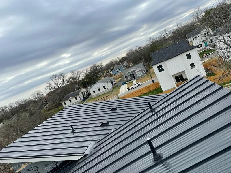 Standing seam metal roof panels with vents for Skylight Repair in Wrentham